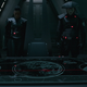 Three Inquistors look at a map.